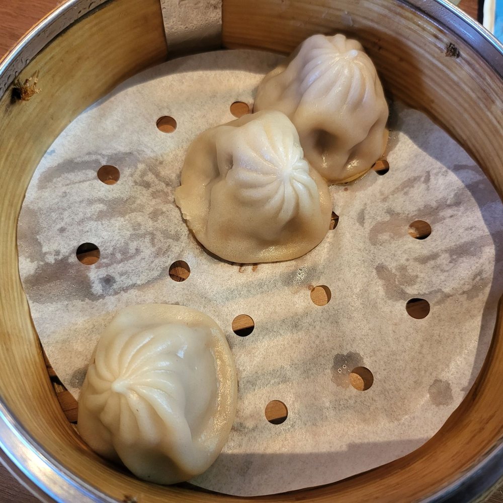 Peking Duck House - Half eaten soup dumplings - Chinese Near Me - Pompano Beach, Florida Peking Duck House - Half eaten soup dumplings - Chinese Near Me - Pompano Beach, Florida