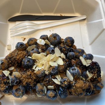 Huckleberry Roasters - Sourdough toast with almond butter, fruit, honey, and almonds - Coffee Roasteries Near Me - Denver, Colorado Huckleberry Roasters - Sourdough toast with almond butter, fruit, honey, and almonds - Coffee Roasteries Near Me - Denver, Colorado