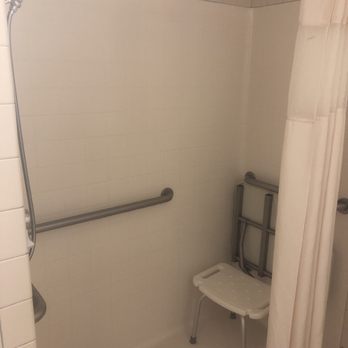 Oceanfront Lodge - Nothing to put shampoo or soap on except this handicap chair - Hotels Near Me - Crescent City, California Oceanfront Lodge - Nothing to put shampoo or soap on except this handicap chair - Hotels Near Me - Crescent City, California