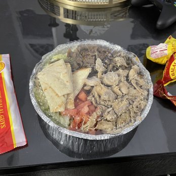 The Halal Guys - a plate of food on a table - Halal Near Me - Countryside, Illinois