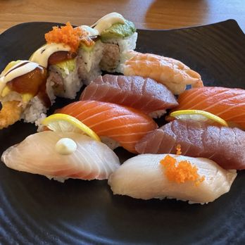 Izumi Sushi - Chef Choice 7 Piece Sushi and 4 Piece Rocklin Roll Combination. Salmon, tuna and yellowtail nigiri - Sushi Bars Near Me - Rocklin, California Izumi Sushi - Chef Choice 7 Piece Sushi and 4 Piece Rocklin Roll Combination. Salmon, tuna and yellowtail nigiri - Sushi Bars Near Me - Rocklin, California