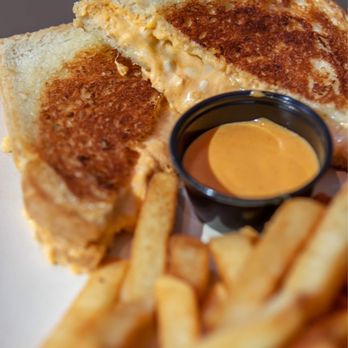 ABC Commissary - Buffalo Chicken Grilled Cheese Sandwich - New American Near Me - Orlando, Florida ABC Commissary - Buffalo Chicken Grilled Cheese Sandwich - New American Near Me - Orlando, Florida