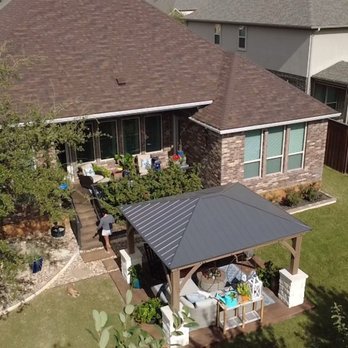 Heritage Roofing & Construction - So happy with the results... there I am walking up the back steps - Roofing Near Me - Bryan, Texas