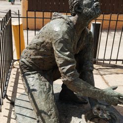 Christ House - "The Servant Christ", bronze sculpture by artist Jimilu Mason, in front of Christ House.