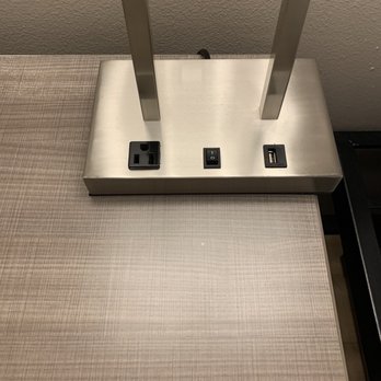 Red Roof Inn Lancaster, TX - Electrical plug and charging ports located on lamp on nightstand. - Hotels Near Me - Lancaster, Texas