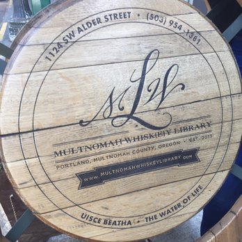 Multnomah Whiskey Library - Whiskey barrel sign out front. - Lounges Near Me - Portland, Oregon