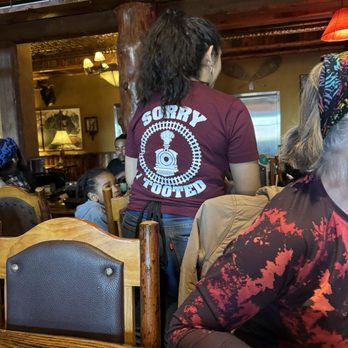 Buffalo Phil's Pizza & Grille - Waitress with humorous t-shirt - American Near Me - Wisconsin Dells, Wisconsin Buffalo Phil's Pizza & Grille - Waitress with humorous t-shirt - American Near Me - Wisconsin Dells, Wisconsin