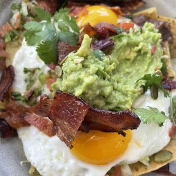 The Henry - RANCHEROS BREAKFAST BOWL sunny side up eggs, roasted jalapeño-pumpkin seed salsa, corn tortillas, black beans, avocado, tomato, queso blanco - Coffee & Tea Near Me - Coronado, California