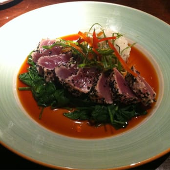 Carlyle - Hong Kong style tuna with rice on a bed of fresh spinach - New American Near Me - Arlington, Virginia Carlyle - Hong Kong style tuna with rice on a bed of fresh spinach - New American Near Me - Arlington, Virginia