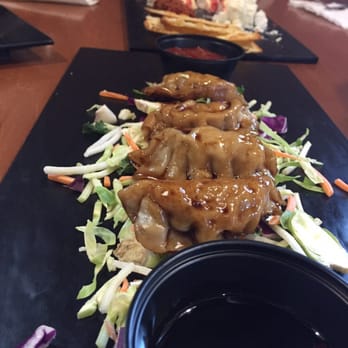Four Mile Brewing - Pot stickers and 4 mile plate. - Breweries Near Me - Olean, New York