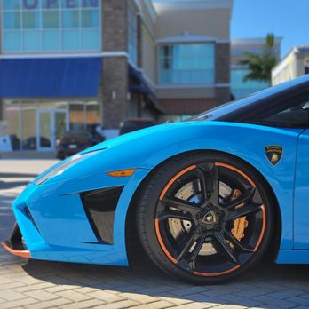 Marco's Pizza - a blue sports car with orange rims - Italian Near Me - Davie, Florida Marco's Pizza - a blue sports car with orange rims - Italian Near Me - Davie, Florida