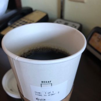 Starbucks - After a second attempt of getting a full cup of coffee this is the best they could do, the first cup they brought was literally half full. - Coffee & Tea Near Me - Gainesville, Florida