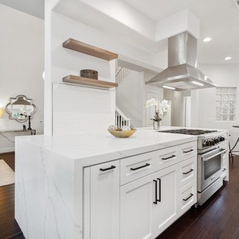 J Cor Construction - a kitchen with a center island - General Contractors Near Me