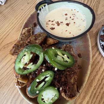 Buenos Dias - Bacon Wrapped Eggrolls & queso - Salvadoran Near Me - Houston, Texas