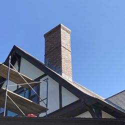 H A O'Neil Masonry - Water-struck brick chimney.