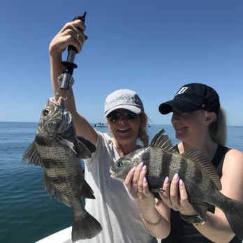 Heritage Fishing Charters - A black drum double! Nice work ladies - Boat Charters Near Me - Charleston, South Carolina Heritage Fishing Charters - A black drum double! Nice work ladies - Boat Charters Near Me - Charleston, South Carolina