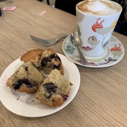 Blueberry muffin with a latte. Blueberry muffin with a latte.