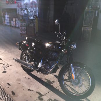 Murphy's Meadville Bottling Inc - a motorcycle parked on the sidewalk - Beer, Wine & Spirits Near Me - Meadville, Pennsylvania