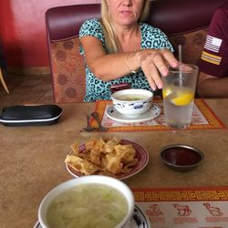 Ping's Cafe - Paula with our bowls of egg drop soup with fried wontons.