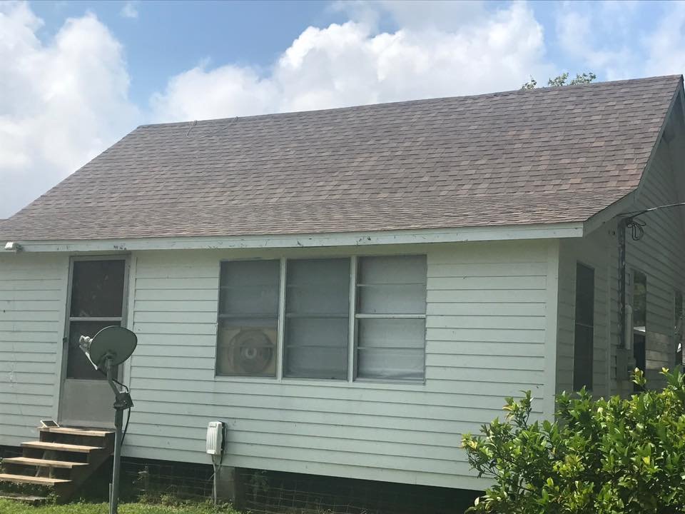 Slide of John Theriots Roofing