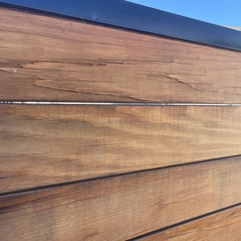 Gil's Garage Door & Gate Services - Wood peeling and cracking on top plank - Garage Door Services Near Me Gil's Garage Door & Gate Services - Wood peeling and cracking on top plank - Garage Door Services Near Me