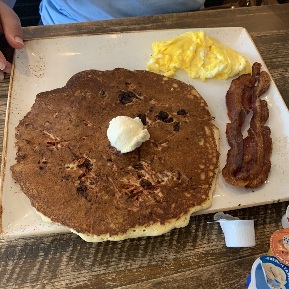 First Watch - Bacon Eggs (Cage free) the biggest pancake. Carrot w/pecan and warm syrup - Breakfast & Brunch Near Me - Hendersonville, Tennessee First Watch - Bacon Eggs (Cage free) the biggest pancake. Carrot w/pecan and warm syrup - Breakfast & Brunch Near Me - Hendersonville, Tennessee