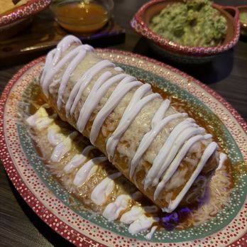 The Pozole Place - California Burrito with red sauce. Guacamole in the back - Soup Near Me - Rancho Cucamonga, California The Pozole Place - California Burrito with red sauce. Guacamole in the back - Soup Near Me - Rancho Cucamonga, California