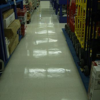 Indoor-Outdoor Maintenance - a store aisle with carts and carts - Flooring Near Me Indoor-Outdoor Maintenance - a store aisle with carts and carts - Flooring Near Me
