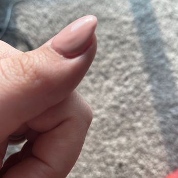 Divine Salon & Spa - Lumpy polish on left thumb. - Nail Salons Near Me - Kennewick, Washington