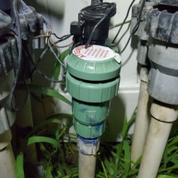 a close up of a water meter a close up of a water meter