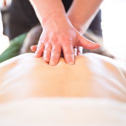 Sandbridge Massage - Working along the spine.