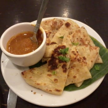 Wild Ginger - Roti Prada with Curry Dipping Sauce. Mildy spicy and my favorite appetizer here! - Restaurants Near Me - Makati, NCR Wild Ginger - Roti Prada with Curry Dipping Sauce. Mildy spicy and my favorite appetizer here! - Restaurants Near Me - Makati, NCR