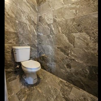 Marino Home Remodeling - a toilet and shower - General Contractors Near Me Marino Home Remodeling - a toilet and shower - General Contractors Near Me