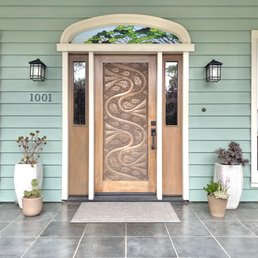 Custom ordered front door, hand carved wood