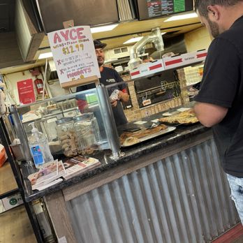 Parma Pizza and Grill - Delivery driver eating food with his bare hands over food that's to be served to customers. - Pizza Near Me - York, Pennsylvania Parma Pizza and Grill - Delivery driver eating food with his bare hands over food that's to be served to customers. - Pizza Near Me - York, Pennsylvania