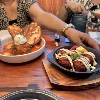 Garp & Fuss - Mangia (large meatball with red sauce and garlic bread) and Blue Crab Frites appetizers - American Near Me - Winter Park, Florida