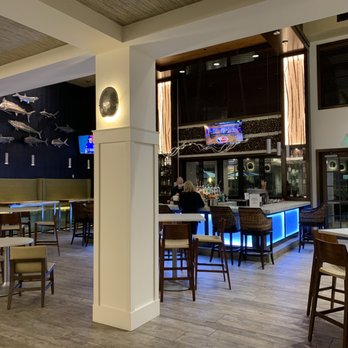 Hyatt House Naples/5th Avenue - Latitude 26 bar inside lobby - Hotels Near Me - Naples, Florida Hyatt House Naples/5th Avenue - Latitude 26 bar inside lobby - Hotels Near Me - Naples, Florida