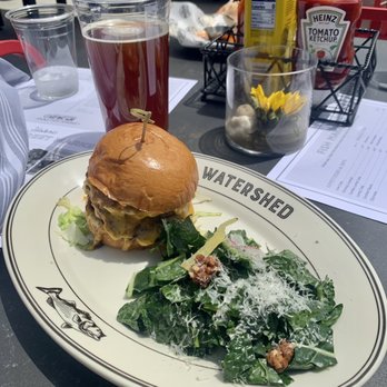 Watershed - Burger with tomato, cheddar (?), carmelized onions & special sauce with side of tasty kale salad. - Seafood Near Me - Baltimore, Maryland