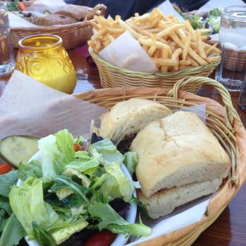 Nepenthe - Ambrosia burger with huge basket of fries - New American Near Me - Big Sur, California Nepenthe - Ambrosia burger with huge basket of fries - New American Near Me - Big Sur, California