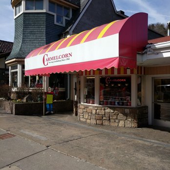 Carmelcorn - the outside of a restaurant with a red and white awning - Specialty Food Near Me - Gatlinburg, Tennessee Carmelcorn - the outside of a restaurant with a red and white awning - Specialty Food Near Me - Gatlinburg, Tennessee