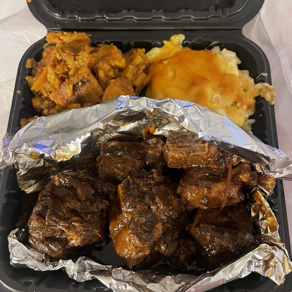Ka'ribbean Fire - Oxtails with sides of Macaroni and Cheese Candied Yams - Caribbean Near Me - La Plata, Maryland Ka'ribbean Fire - Oxtails with sides of Macaroni and Cheese Candied Yams - Caribbean Near Me - La Plata, Maryland