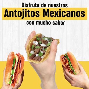 La Hechizera Tortas - two hands holding two tacoss - Mexican Near Me - North Richland Hills, Texas La Hechizera Tortas - two hands holding two tacoss - Mexican Near Me - North Richland Hills, Texas