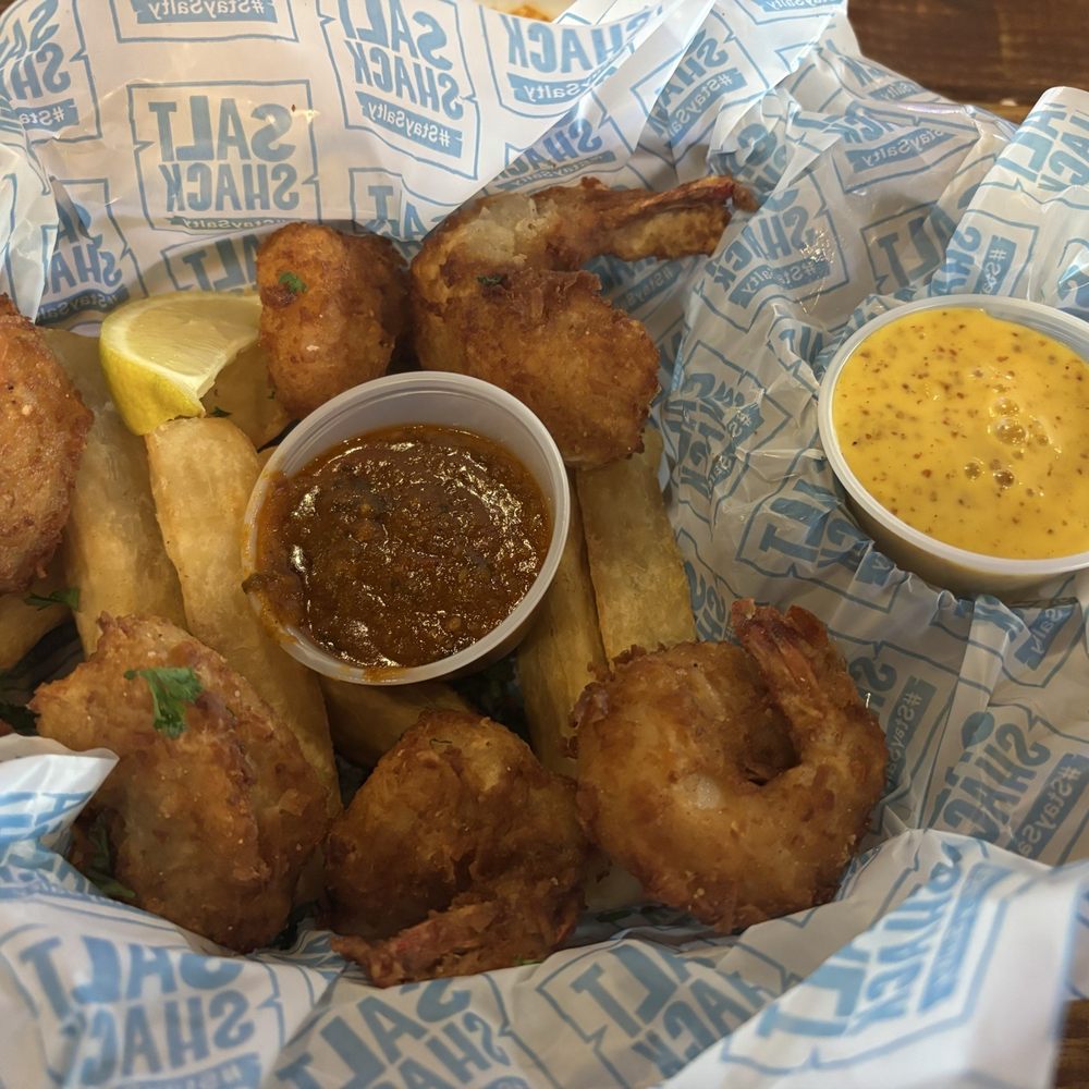 Salt Shack - Coconut shrimp with yuca fries - Seafood Near Me - Clermont, Florida Salt Shack - Coconut shrimp with yuca fries - Seafood Near Me - Clermont, Florida
