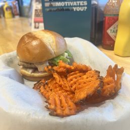 a sandwich and sweet potato fries a sandwich and sweet potato fries