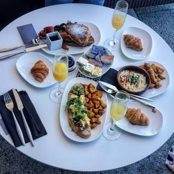 AC Sky Bar - French toast, open face brunch toast, and egg & prosciutto cazuela - Bars Near Me - Orlando, Florida AC Sky Bar - French toast, open face brunch toast, and egg & prosciutto cazuela - Bars Near Me - Orlando, Florida
