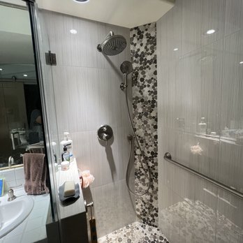 Alpha Regional - a bathroom with a shower and sink - General Contractors Near Me - Tustin, California Alpha Regional - a bathroom with a shower and sink - General Contractors Near Me - Tustin, California