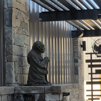 Darkside Brick Oven Pizza - Yoda fountain - Pizza Near Me - Boerne, Texas Darkside Brick Oven Pizza - Yoda fountain - Pizza Near Me - Boerne, Texas