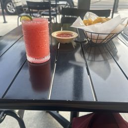 Strawberry margarita! Fresh chips and salsa.