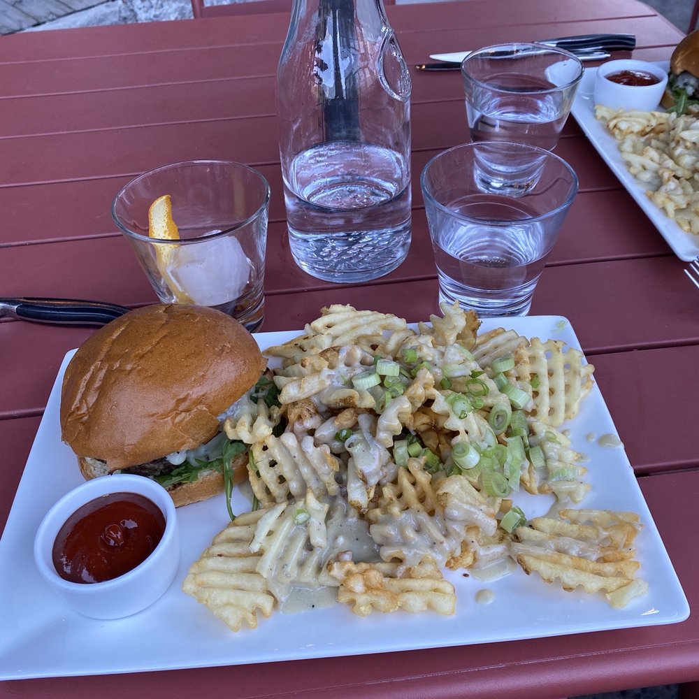 Trio American Bistro - Burger and Waffle Fries with Cheese Sauce. - New American Near Me - Jackson, Wyoming Trio American Bistro - Burger and Waffle Fries with Cheese Sauce. - New American Near Me - Jackson, Wyoming
