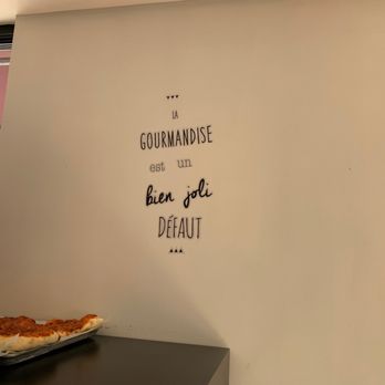 Tel Père Tel Fils - a slice of pizza on a table - Bakeries Near Me - Montreal, Quebec Tel Père Tel Fils - a slice of pizza on a table - Bakeries Near Me - Montreal, Quebec